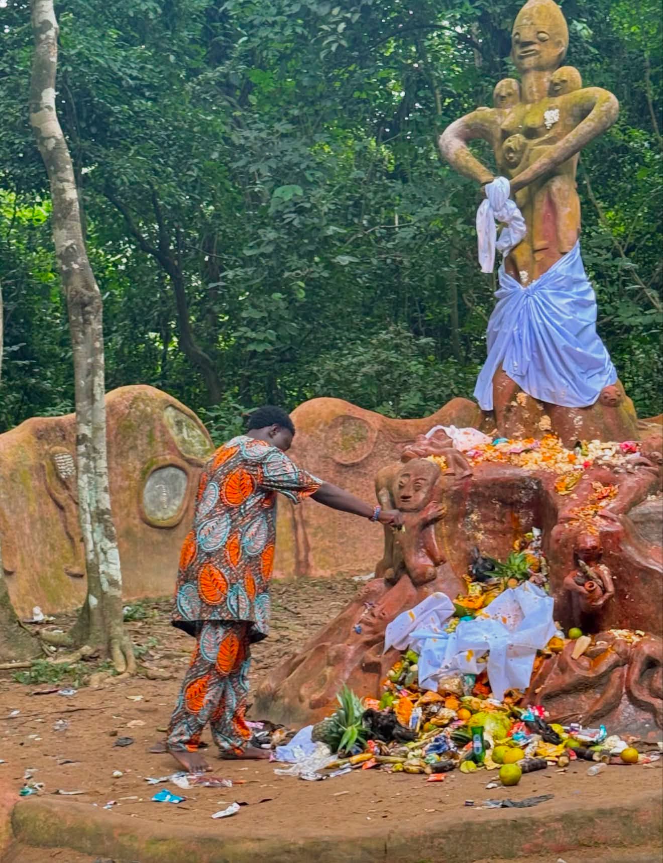 Traditional spiritual practice at a shrine, the kind of personal work Master Sanhati brings to private consultations